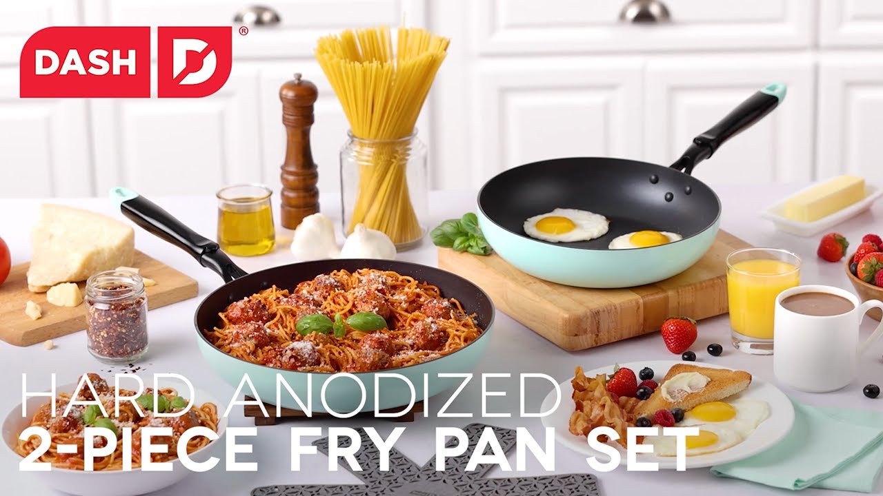 Recipes are demonstrated using the pan including frying an egg and cooking meatballs with spaghetti. The pan is washed in a dishwasher and stacked for storage with protectors in-between the two pans.