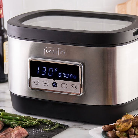 Precise cooking salmon and steak inside the circulating water inside of the Dash Chef Series Digital Sous Vide Bath