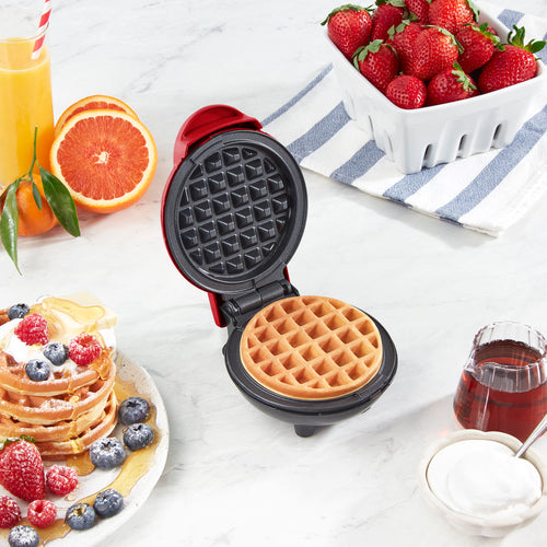 Plate of 3 waffles with a Rise by Dash Mini Waffle Maker