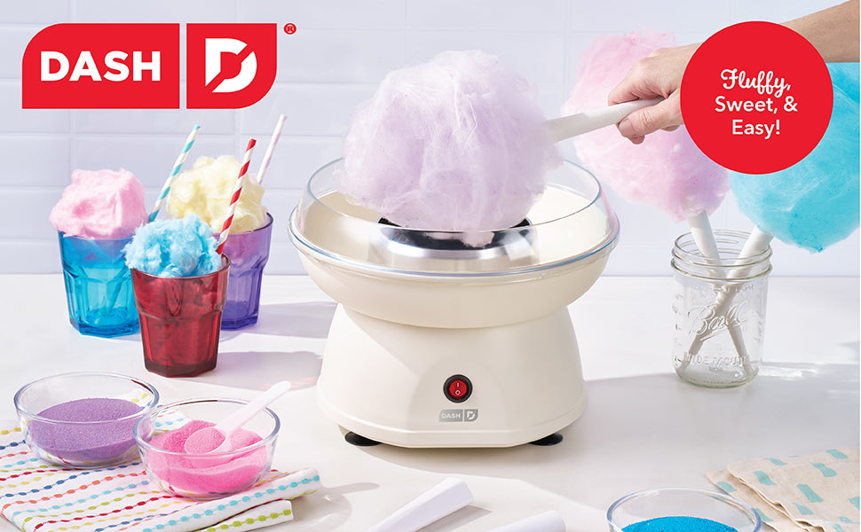 Cotton candy maker with cotton candy and cups on a white background, featuring the Dash brand.
