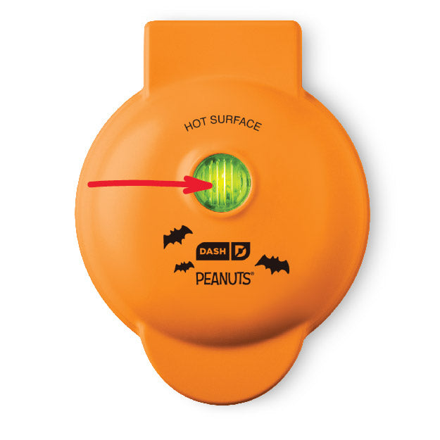 Orange hot surface indicator with green light and red arrow on a white background