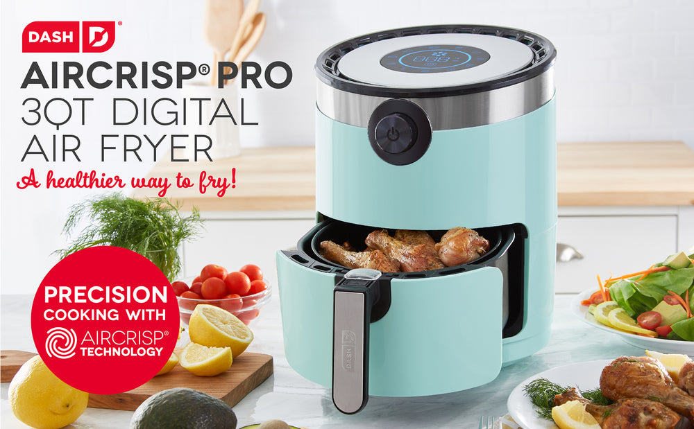 An Aircrisp Pro Digital Air Fryer 3 Quart sits ajar full of drumsticks next to the tagline, “A healthier way to fry!” 