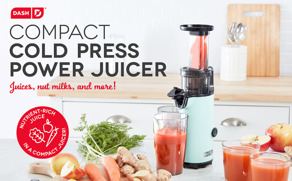 A blue Compact Cold Press Power Juicer with carrots can make juices, nut milks, and more.