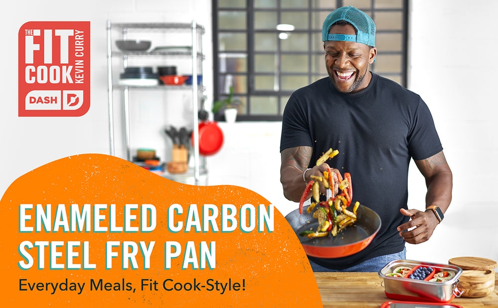 The Fit Cook Kevin Curry in a blue backwards cap flips vegetables on the Enameled Carbon Steel Fry Pan.