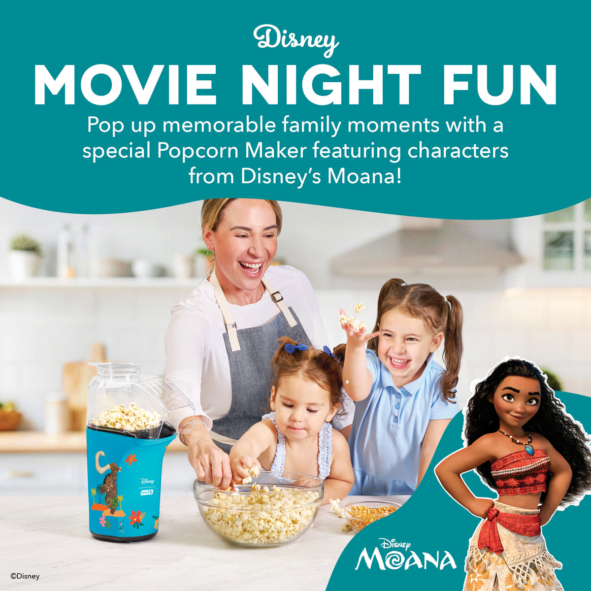 Blue popcorn maker with Disney's Moana character graphics next to bowl of popcorn and family in kitchen.