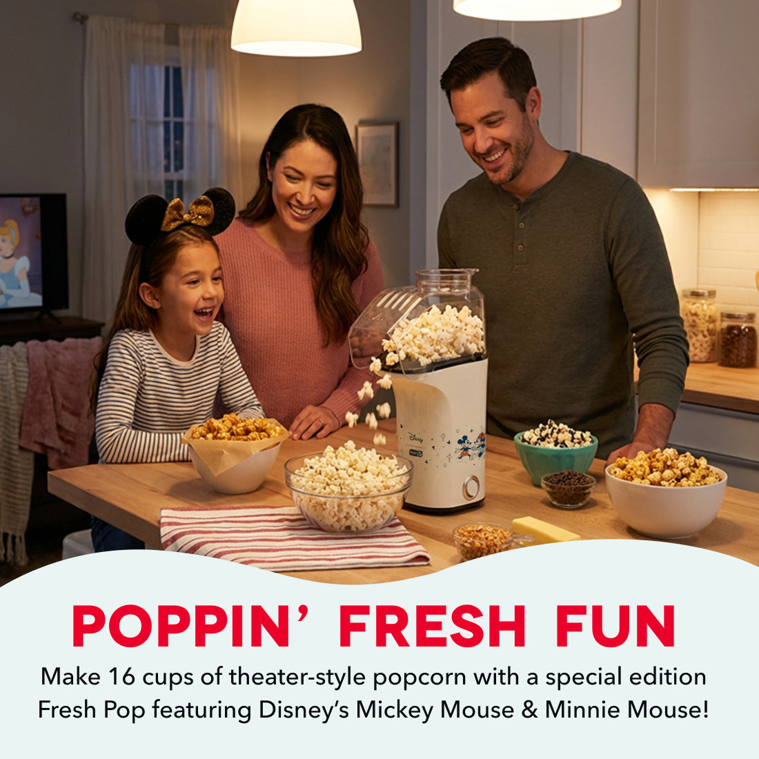 White popcorn maker on kitchen counter with family and bowls of popcorn and caramel corn.