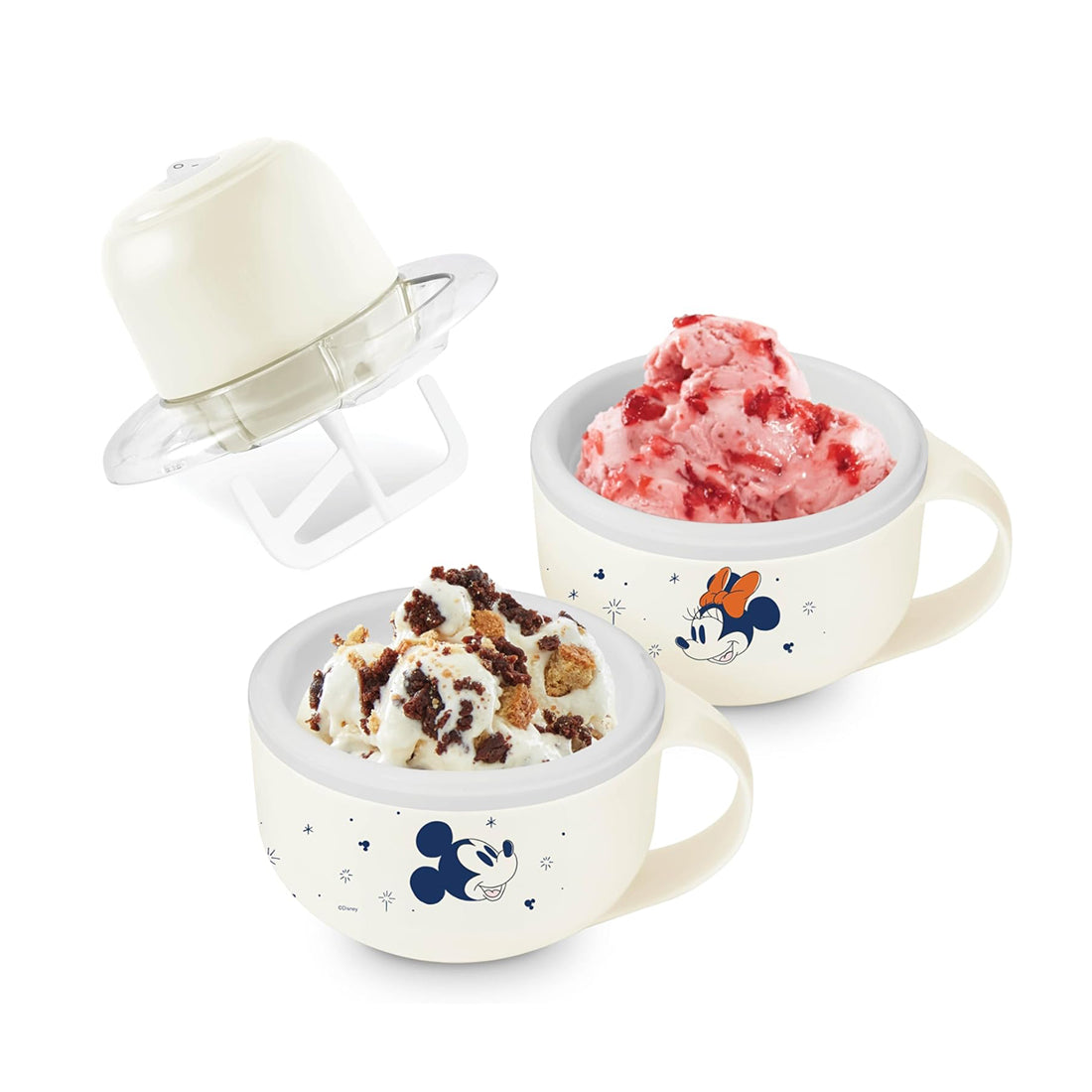 Cream-colored mug ice cream maker with character design, shown with lid, churning mechanism, and two mugs filled with strawbe