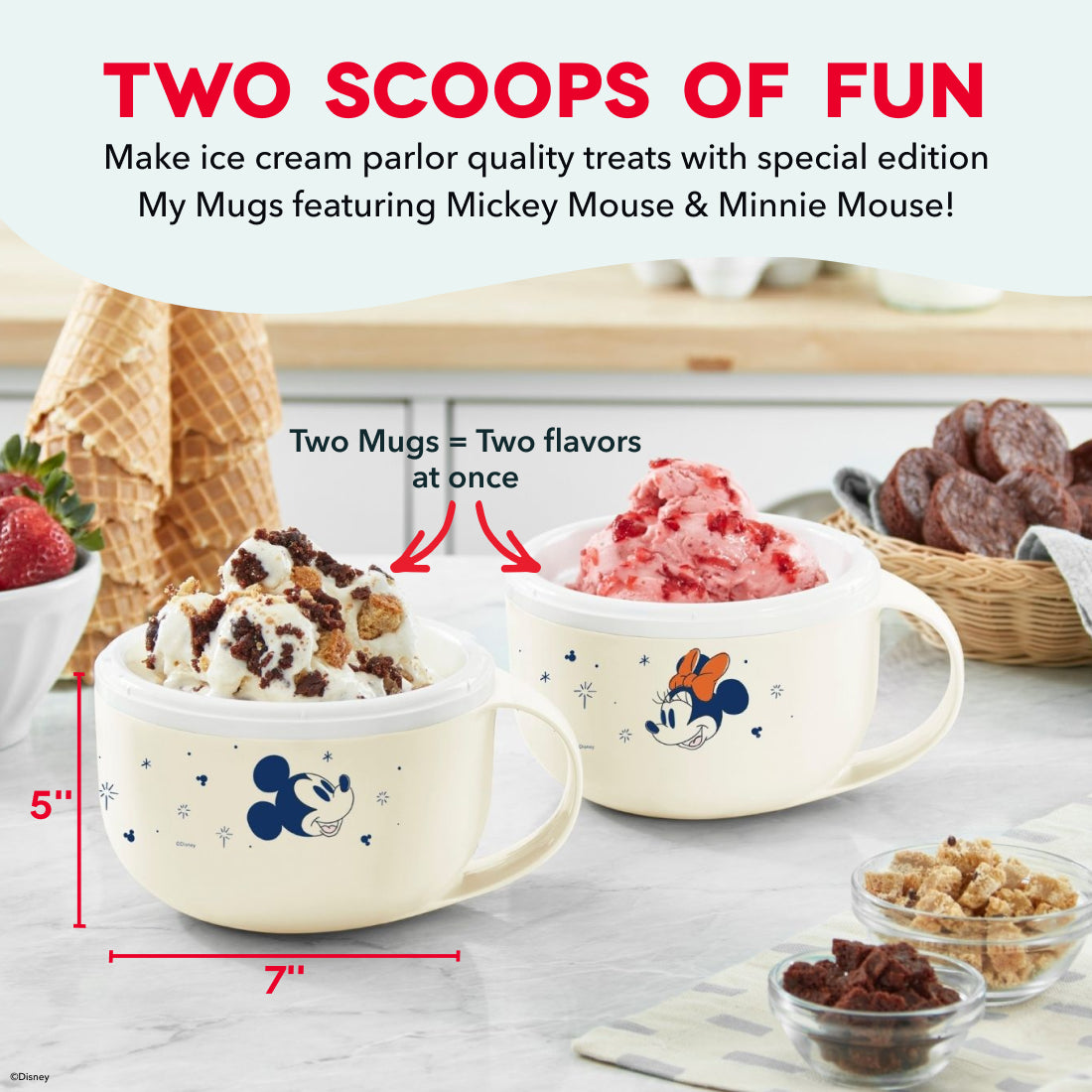 Two ceramic mugs with Mickey and Minnie Mouse designs filled with ice cream, surrounded by ice cream cones, fresh berries, an