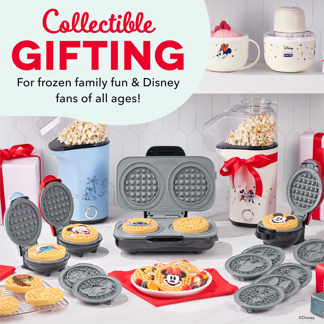 White mug-shaped ice cream maker with Disney character design and removable lid, displayed among waffle makers and popcorn ma