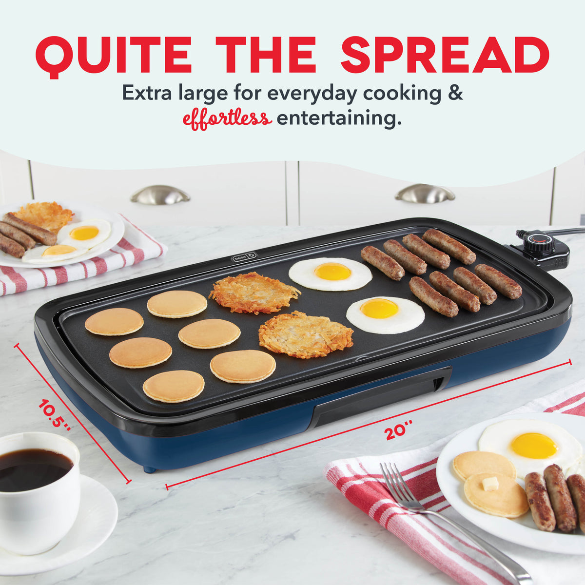 Blue and black electric griddle with non-stick surface cooking pancakes, eggs, and sausages simultaneously.