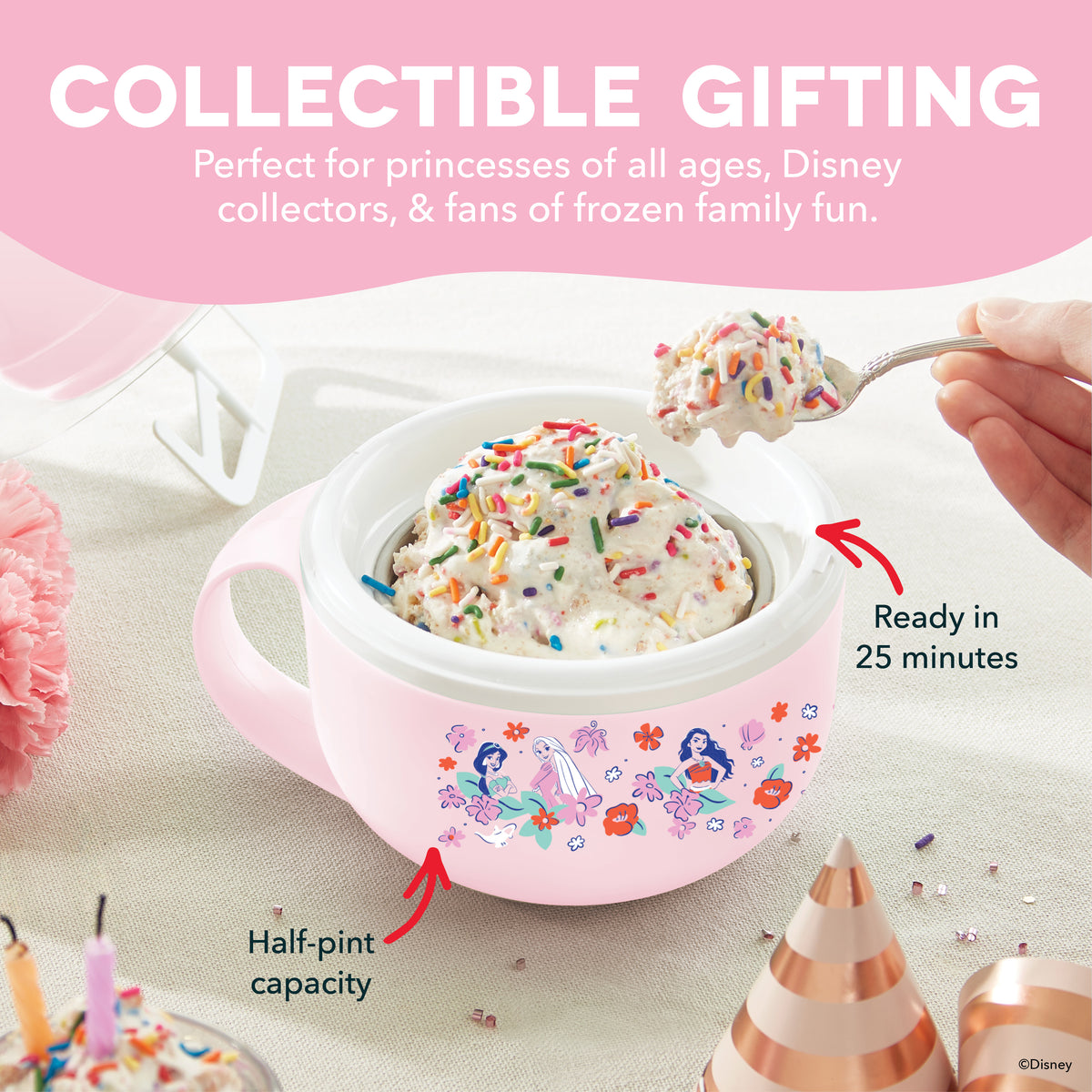 Pink mug-shaped ice cream maker with Disney princess graphics, filled with vanilla ice cream and colorful sprinkles.