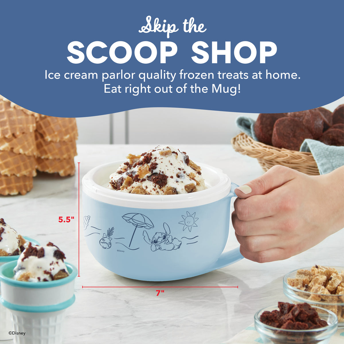 Light blue mug with illustrated designs held in hand, filled with ice cream and toppings, displayed with measurements and sur