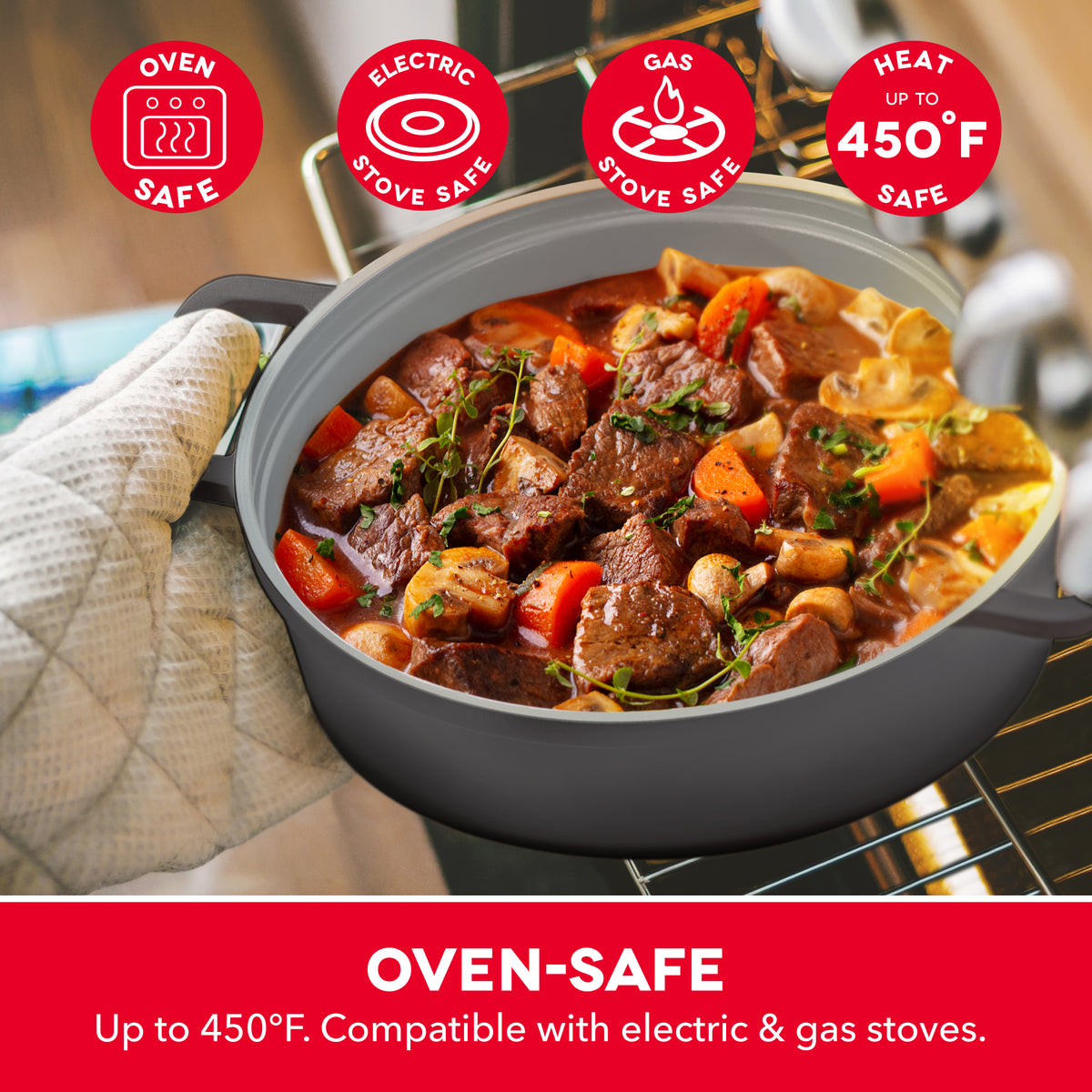 Gray ceramic cookware pot with beef stew, vegetables, and herbs on electric burner with safety badges displayed.