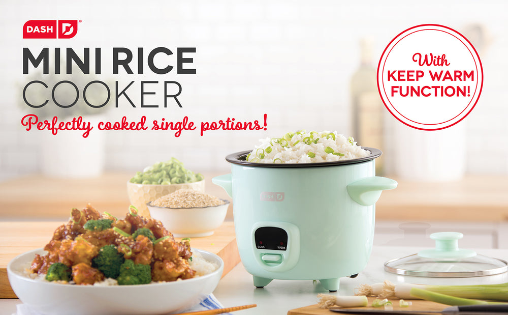 An aqua colored Mini Rice Cooker brimming with white rice.