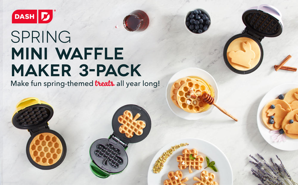 A spread of mini waffle makers in bunny, shamrock, and honeycomb shapes.