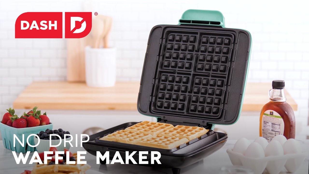 Waffle batter is added to the maker and cooked to make four square mini waffles and two waffle sticks.