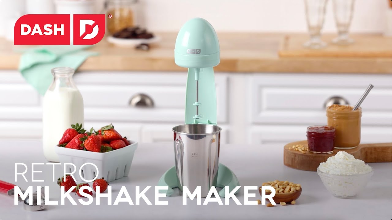 Ice cream, peanut butter, jelly, and milk are added to the milkshake maker and churned, whip creams and toppings are added to the completed milkshake. 