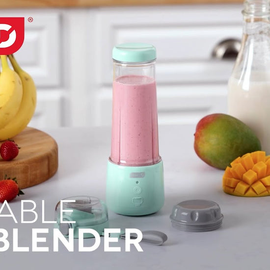 Various fruits and juices are added to the USB blender to create smoothies. 