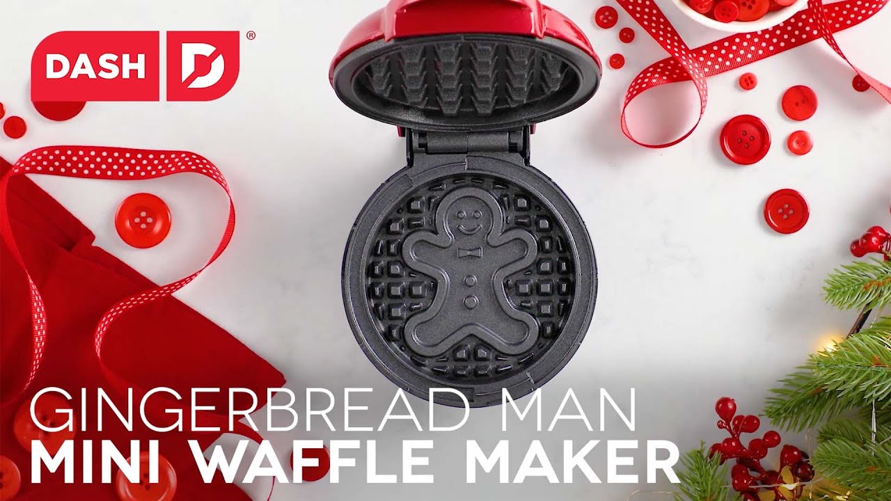 Waffle batter is added to the waffle maker creating a Gingerbread Man printed onto the cooked waffle.