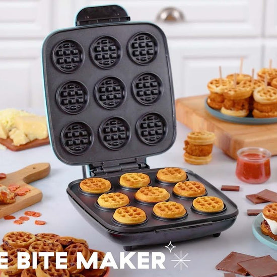 Waffle batter is poured into the waffle bite maker and cooked. Nine mini waffles are made and plated and made into s’mores, mini pizzas, and more.