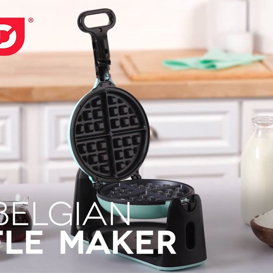 A batter is poured into the waffle maker and using the cool touch handle the waffle maker is turned 180 degrees to create Belgian waffles. 
