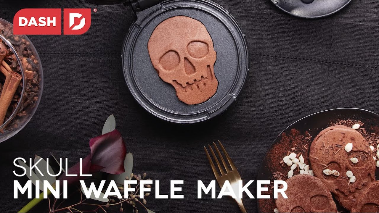 Four inch mini waffles with a skull shape are shown in the mini waffle maker.