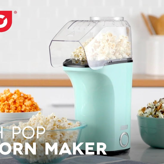 Kernels are added into the top chamber of the popcorn maker, the lid is placed on top with a slab of butter that melts onto the popcorn while it pops.