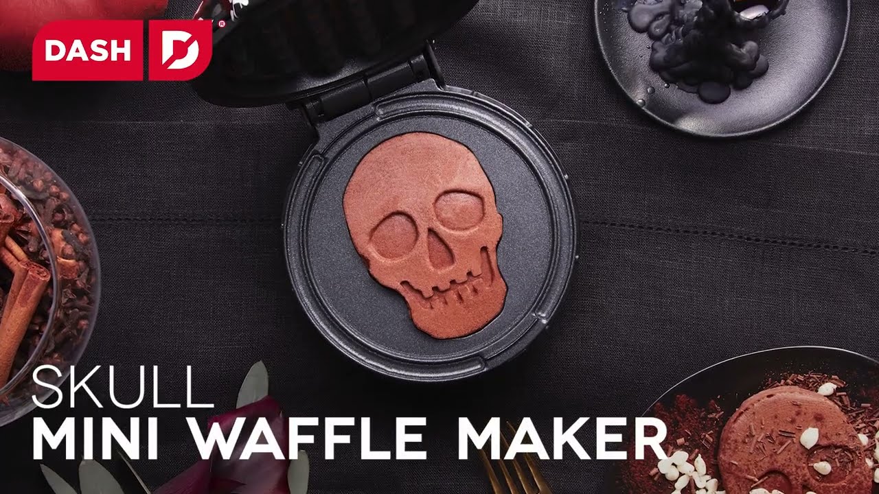 Four inch mini waffles with a skull shape are shown in the mini waffle maker.