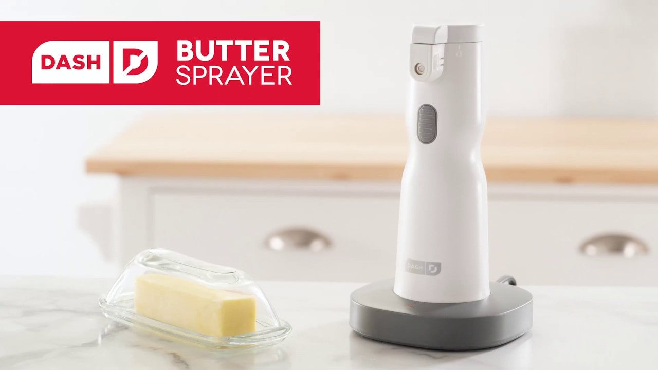 A slab of butter is added to the butter sprayer, the sprayer is then used to spray butter on bread, popcorn, vegetables, and a pan.