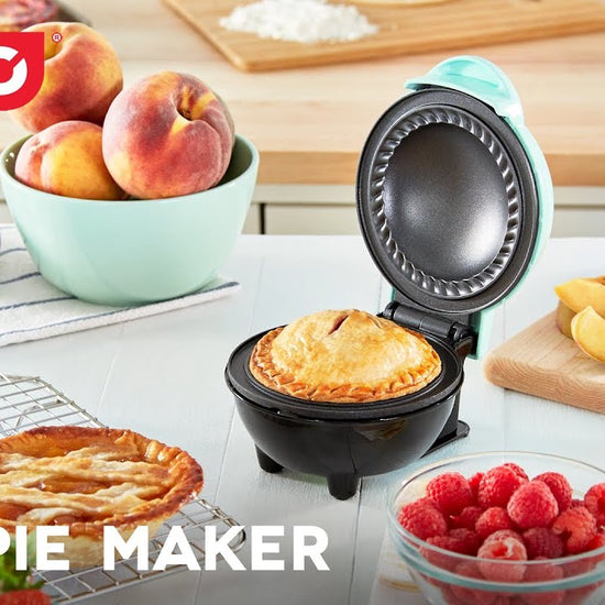 A pie crust is rolled out and cut with the included crust cutter and placed into the maker, pie filling is added and the pie is cooked creating one mini pie.