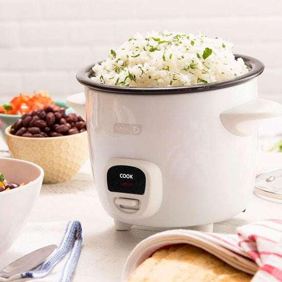 Rice and beans, chicken noodle soup, quinoa, and Mac and cheese are shown in the rice cooker.